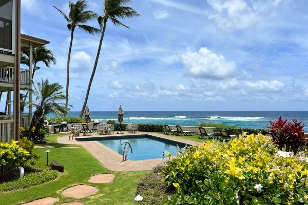 Alihi Lani Kauai south shore vacation rental oceanfront heated pool at midday