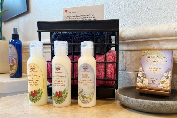 bathroom amenities include complementary local bath products from Island Soap and Candle Works