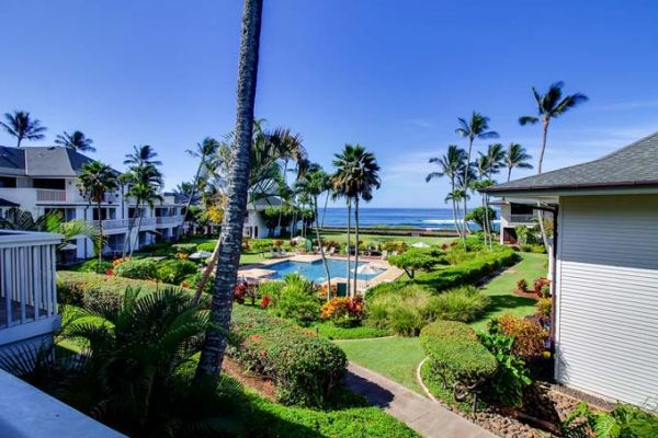 Poipu Kapili unit 22 lanai view across resort pool to ocean
