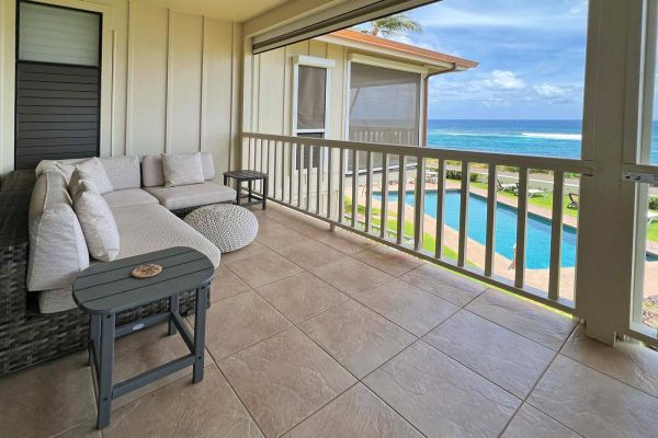 comfortable outdoor sectional couch seating with foot rest and end tables